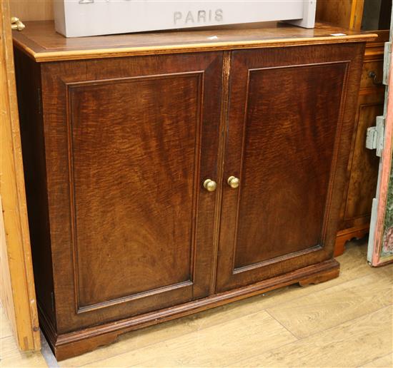 A Victorian mahogany two door cupboard W.112cm